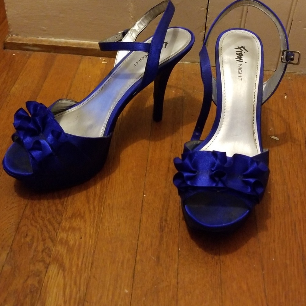 Blue heels worn one tine